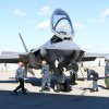 Flight crew members meet the pilots as they emerge from their aircraft.